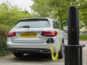 Silver Mercedes electric vehicle charging on a Chargemaster fastpost