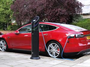 Tesla car electric charging at a Chargemaster fastpost