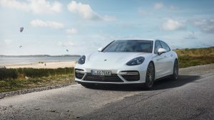 Porsche panamera 2018 on the road by the beach