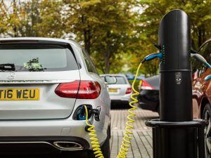 Mercedes and other vehicles EV charging on a public fast post