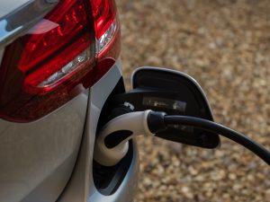 Charging cable plugged into electric vehicle